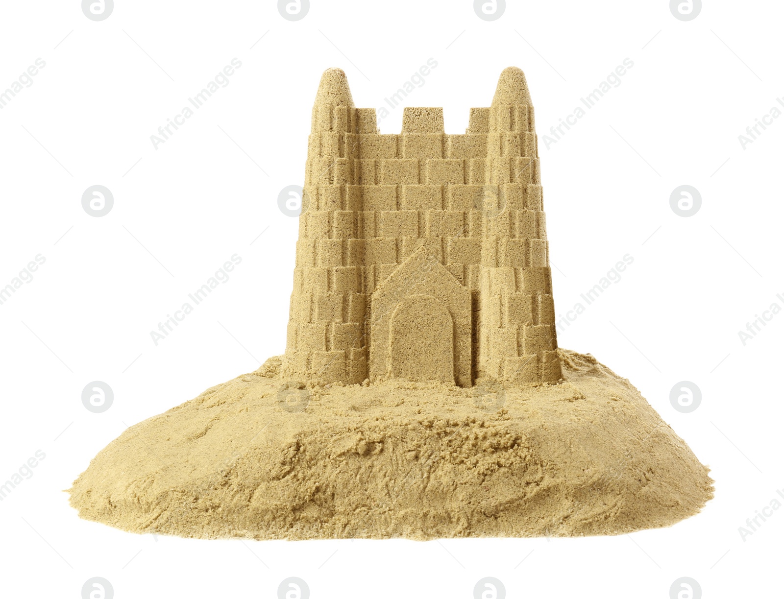 Photo of Pile of sand with beautiful castle isolated on white