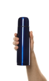 Man holding blue thermos on white background, closeup