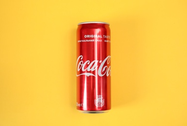 Photo of MYKOLAIV, UKRAINE - NOVEMBER 14, 2018: Coca-Cola can on color background, top view