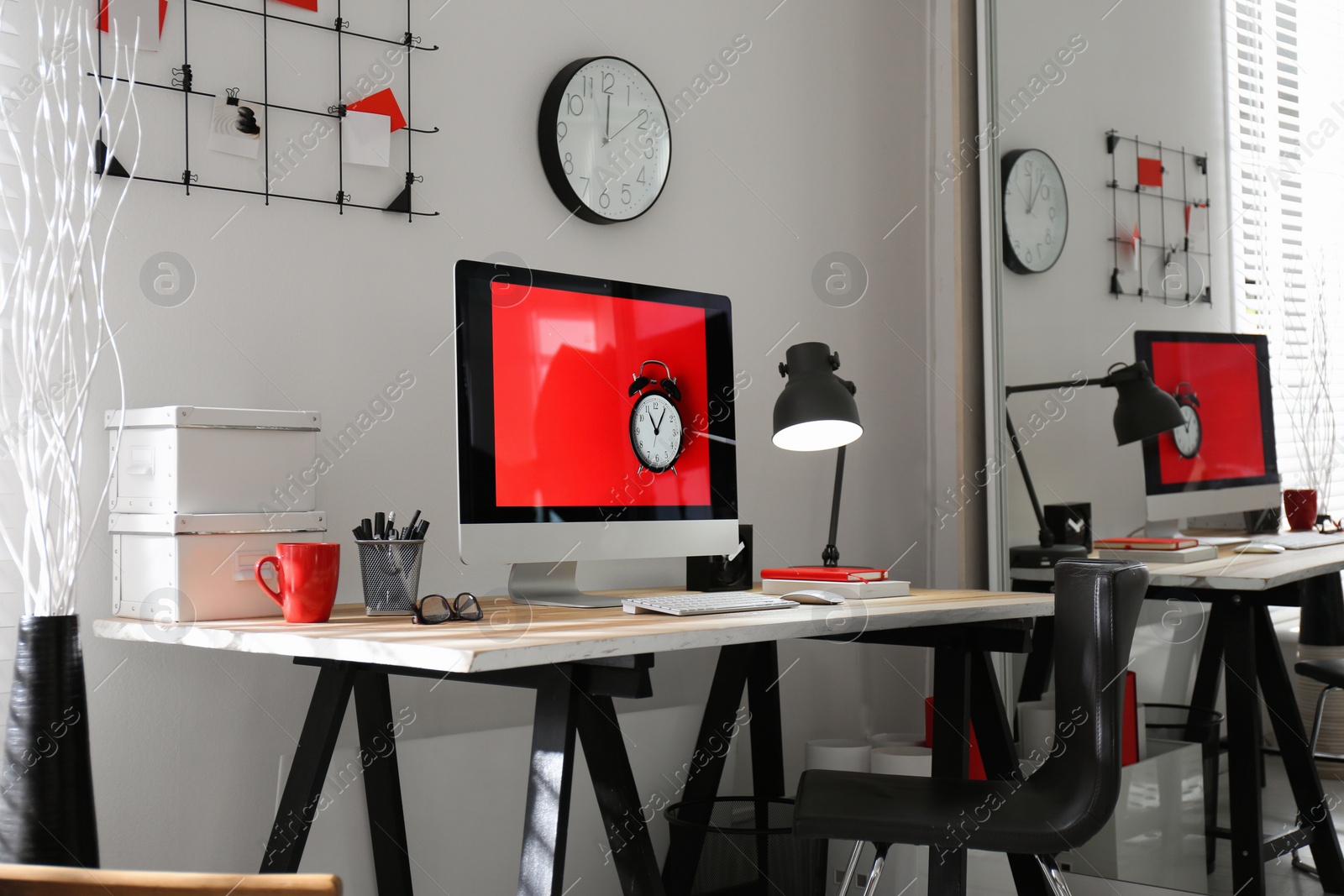 Photo of Modern computer on desk in room. Home workplace