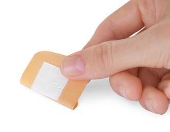 Photo of Woman with medical adhesive bandage isolated on white, closeup