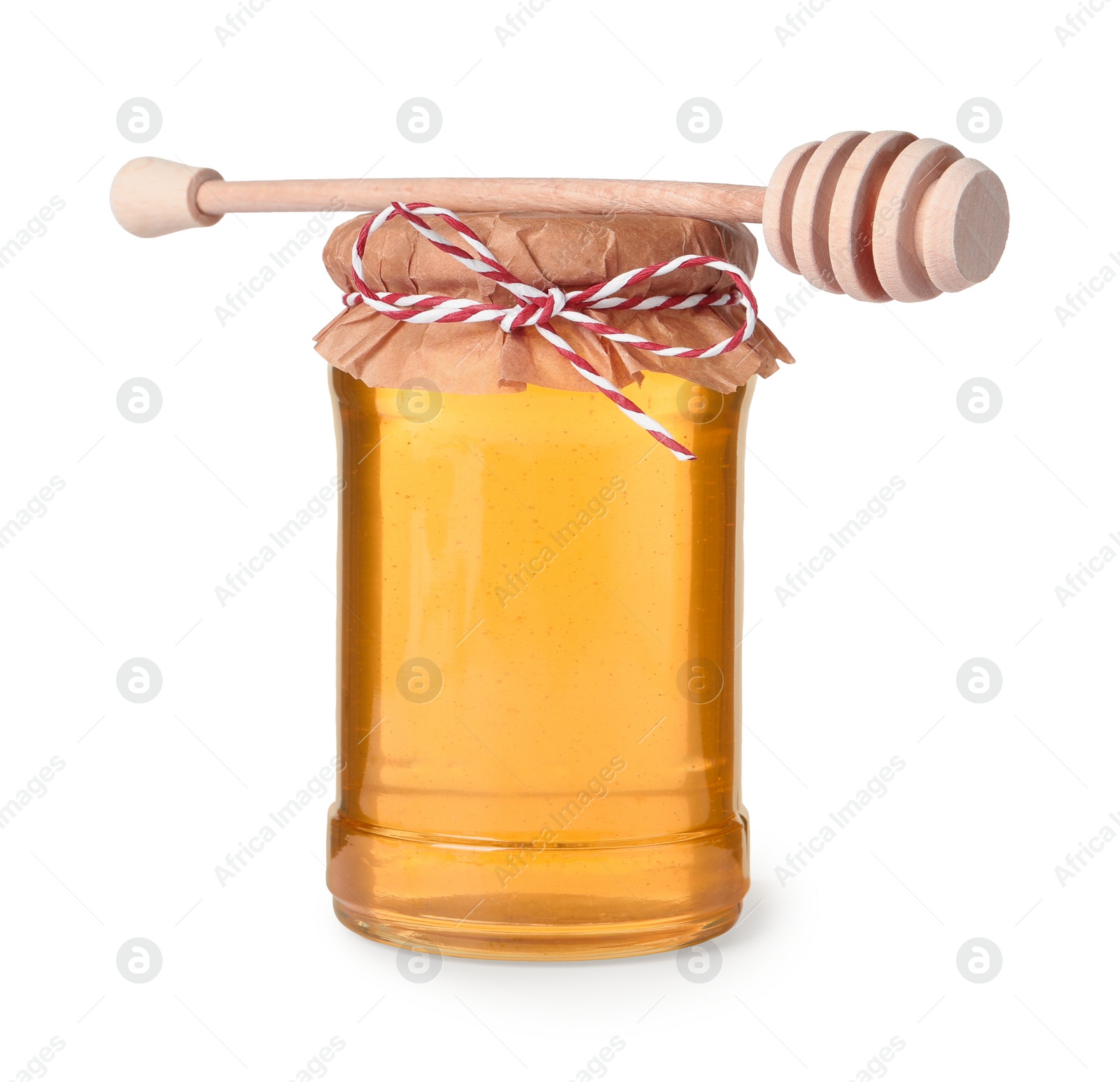 Photo of Tasty honey in glass jar and dipper isolated on white