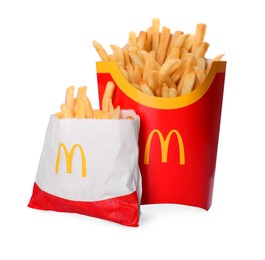 Photo of MYKOLAIV, UKRAINE - AUGUST 11, 2021: Big and small portions of McDonald's French fries on white background