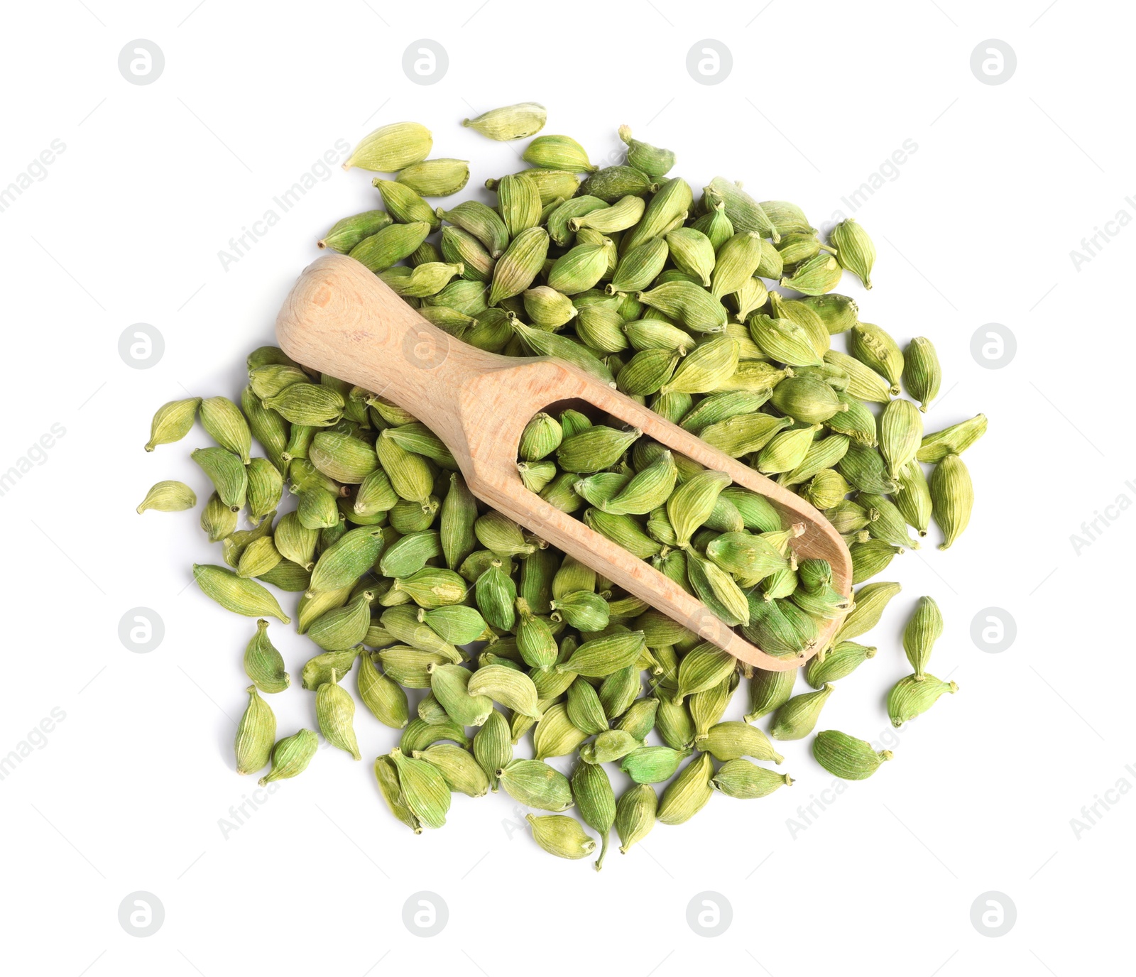 Photo of Wooden scoop with dry cardamom seeds on white background, top view