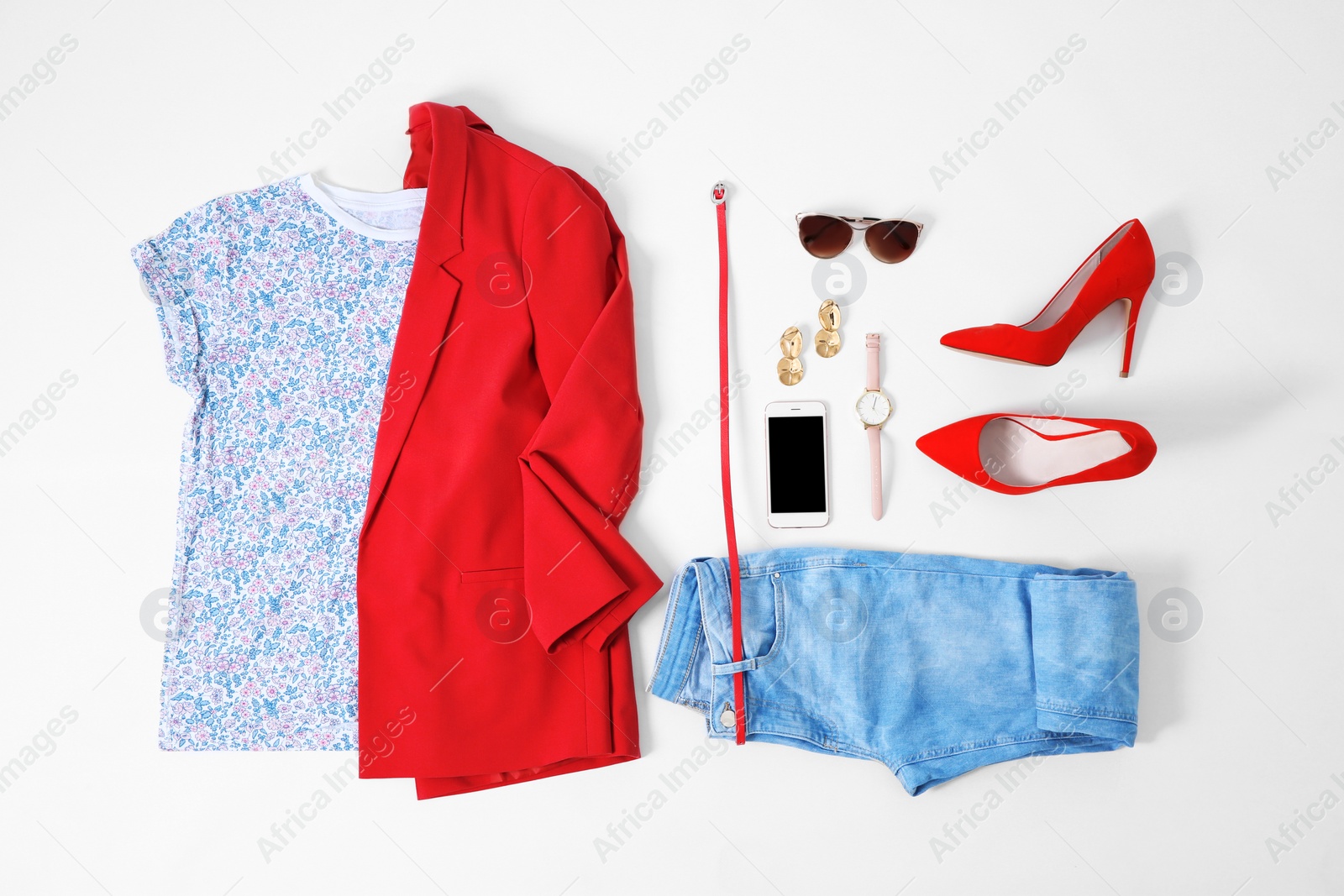 Photo of Set of trendy female clothes and accessories on light background, flat lay