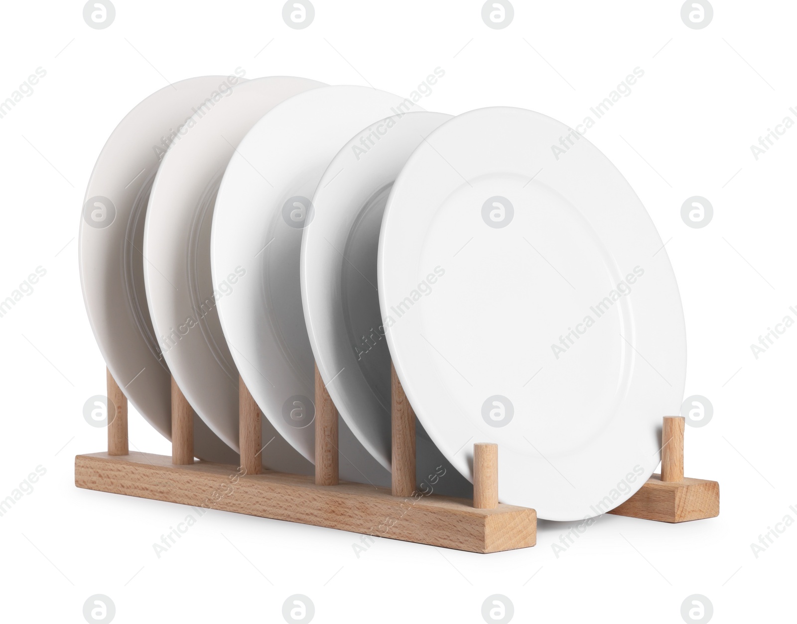 Photo of Many clean plates on wooden stand isolated on white