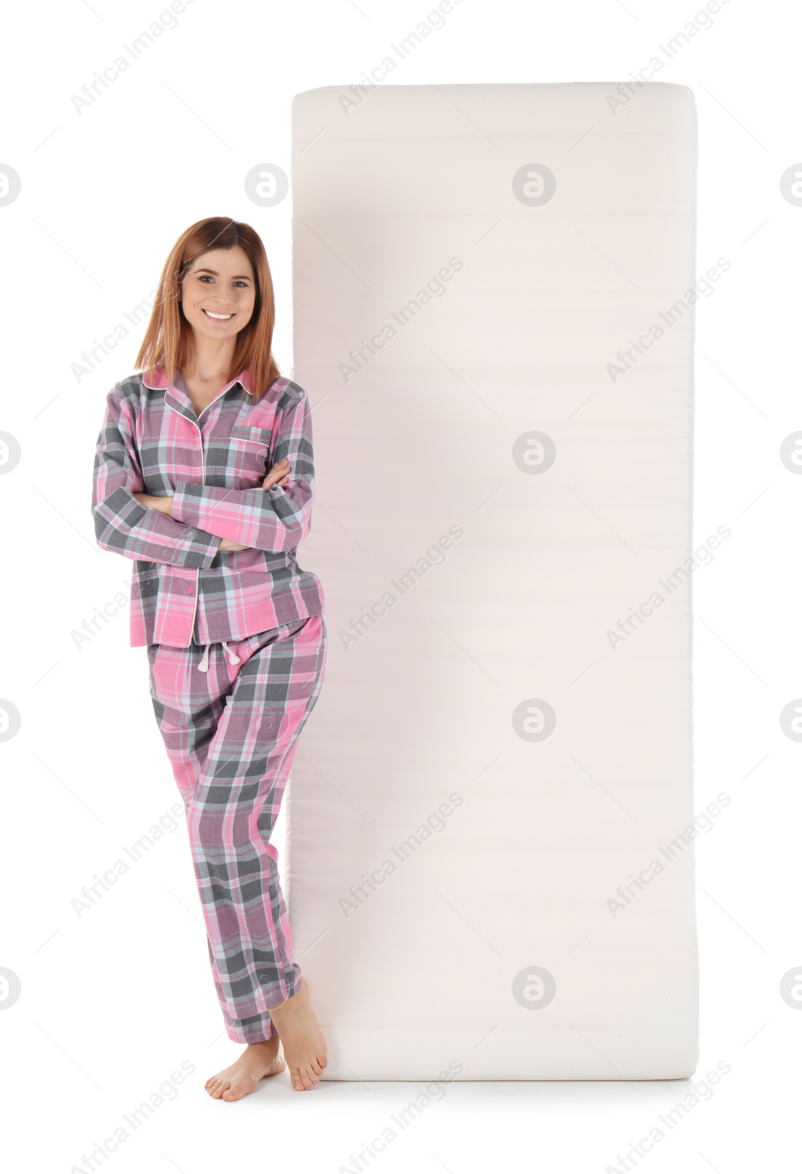 Photo of Woman with comfortable mattress isolated on white