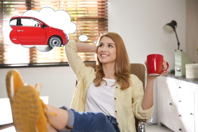 Young woman with cup of drink dreaming about new car at workplace