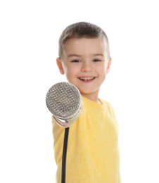 Cute funny boy with microphone on white background