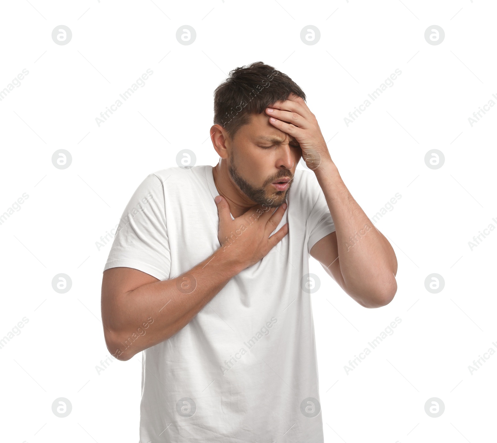 Photo of Man suffering from pain during breathing on white background