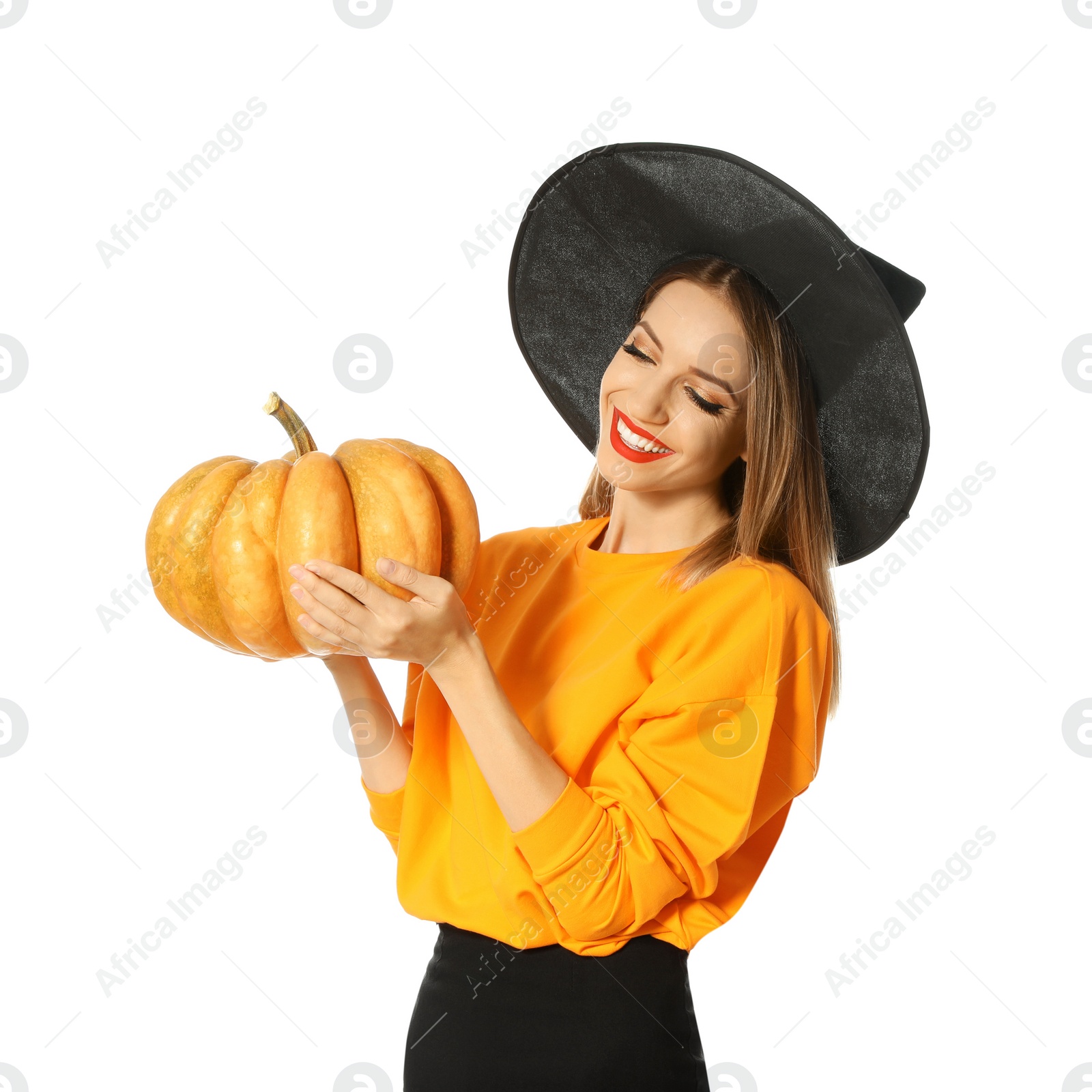 Photo of Beautiful woman wearing witch costume with pumpkin for Halloween party on white background