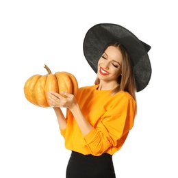 Photo of Beautiful woman wearing witch costume with pumpkin for Halloween party on white background