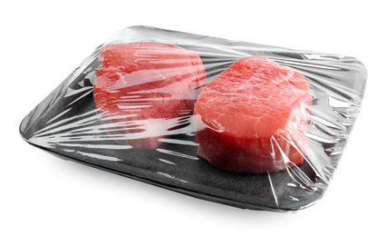 Photo of Fresh raw beef cut in plastic container isolated on white