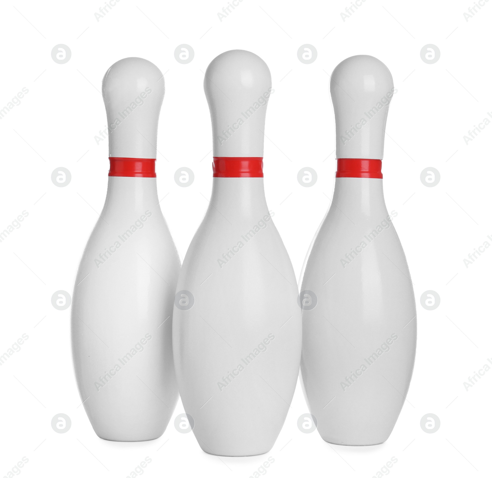 Photo of Bowling pins with red stripes isolated on white