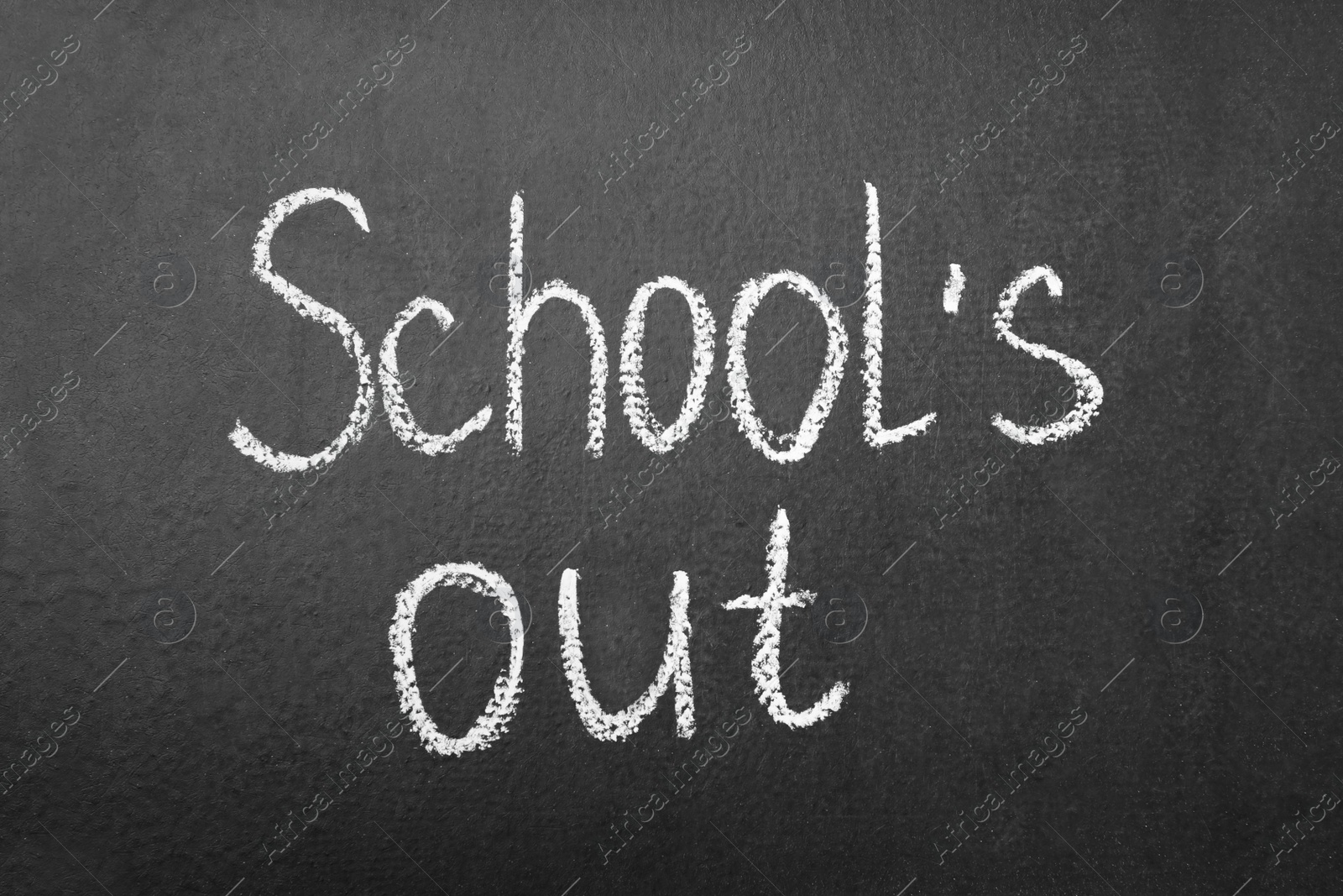 Photo of Words School's Out on blackboard. Summer holidays