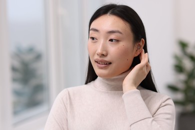 Photo of Portrait of smiling confident businesswoman in office