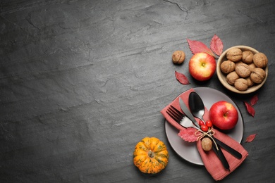 Festive table setting on black background, flat lay with space for text. Thanksgiving Day celebration
