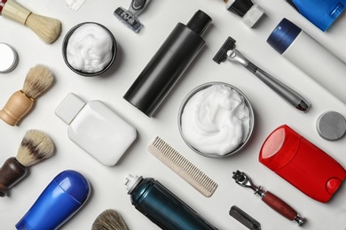Photo of Flat lay composition with shaving accessories for men on white background
