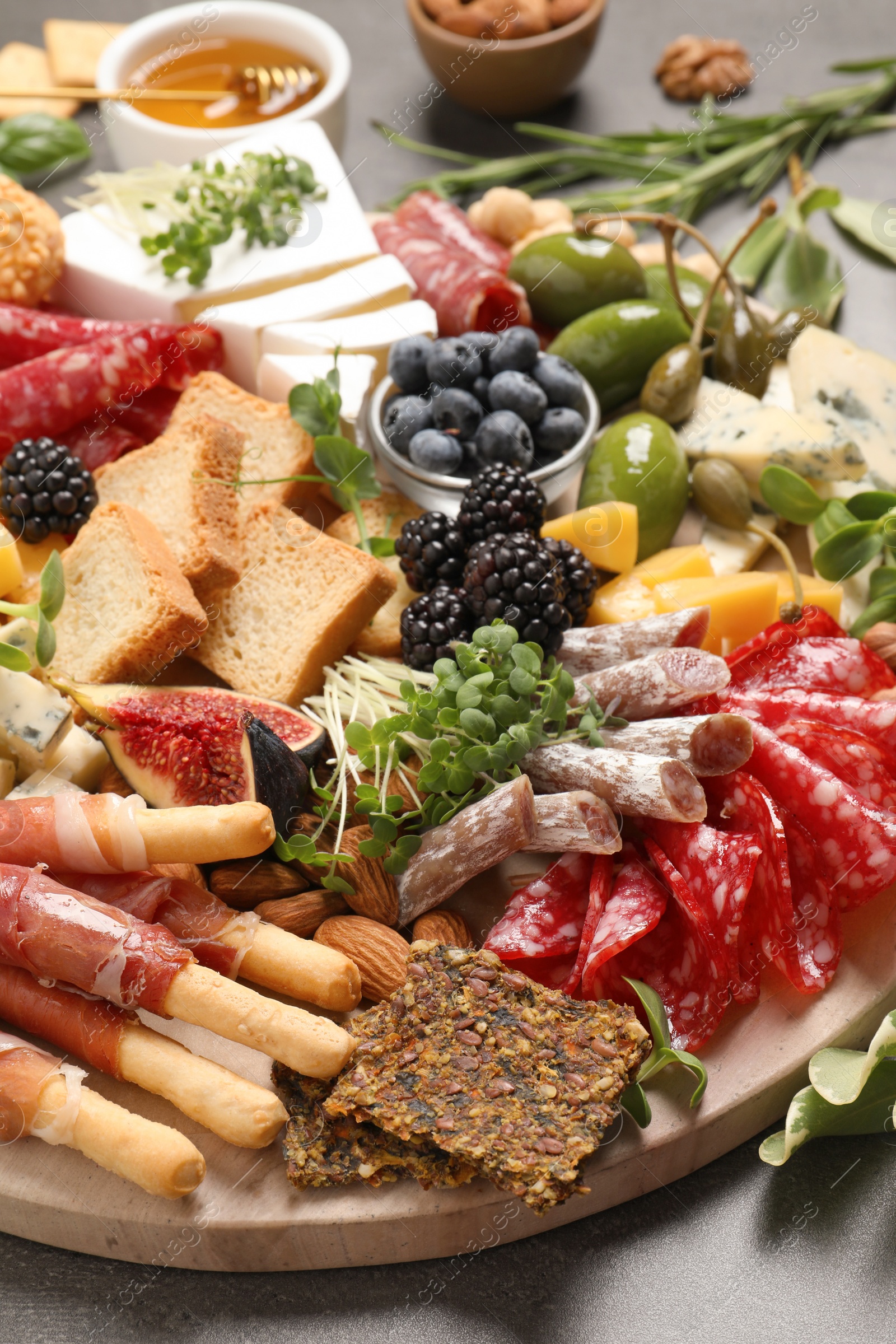 Photo of Many different tasty appetizers on table, closeup