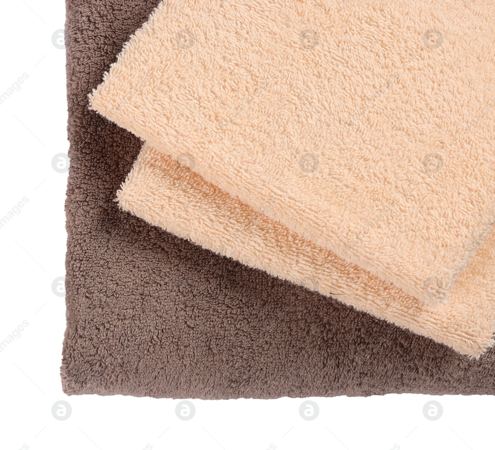 Photo of Soft colorful terry towels isolated on white, top view