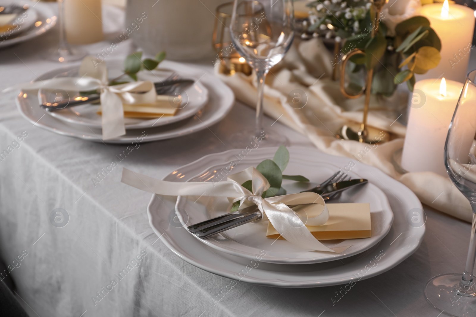 Photo of Festive table setting with beautiful decor indoors