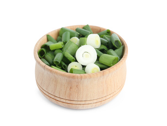 Photo of Cut green spring onion in wooden bowl isolated on white