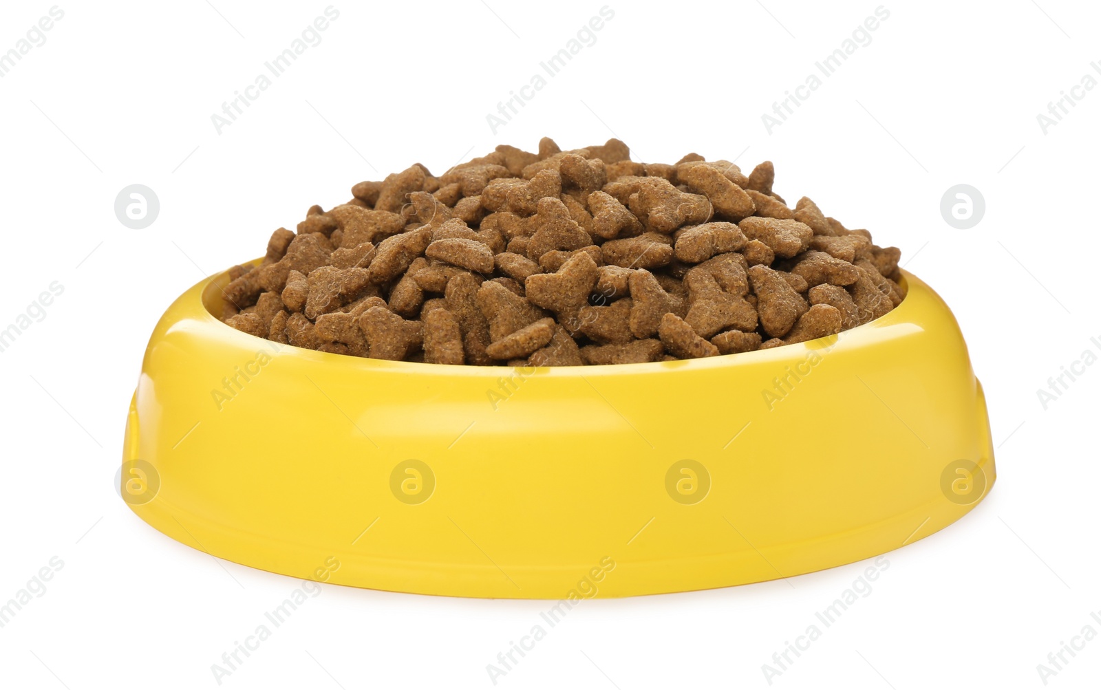 Photo of Dry food in yellow pet bowl isolated on white