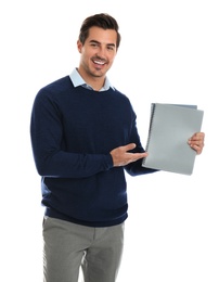 Young male teacher with notebooks on white background