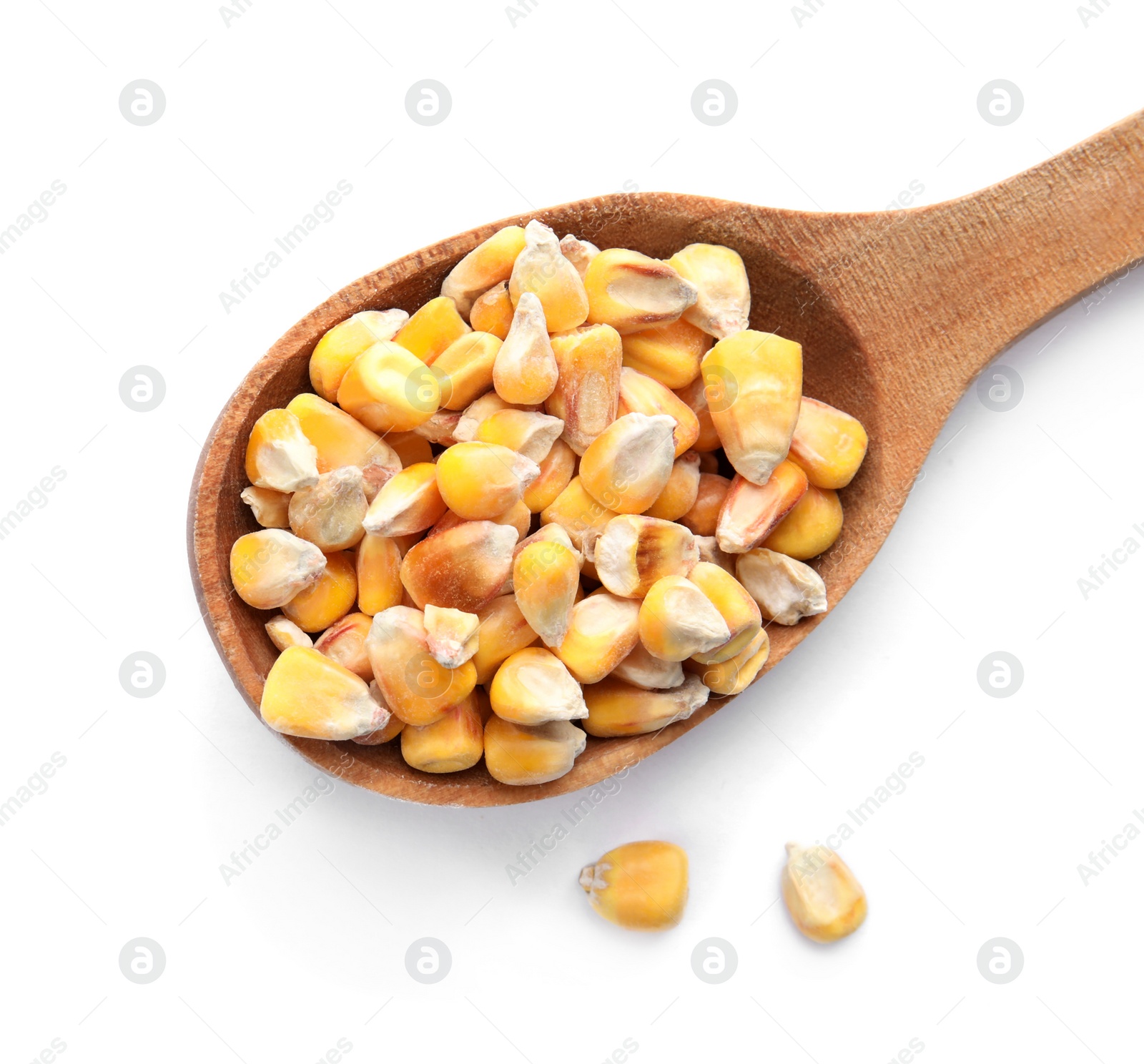 Photo of Wooden spoon with corn kernels on white background, top view