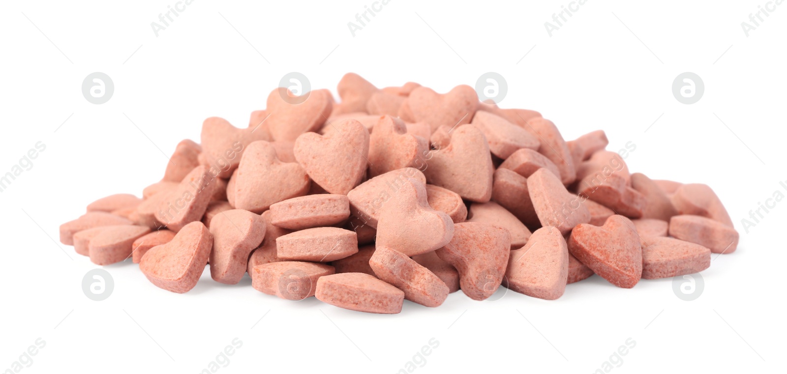 Photo of Many heart shaped vitamins for pets isolated on white