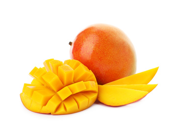 Whole and cut ripe mangoes isolated on white. Exotic fruit