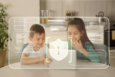 Image of Child safety online. Little kids using tablet at home. Illustration of internet blocking app on foreground