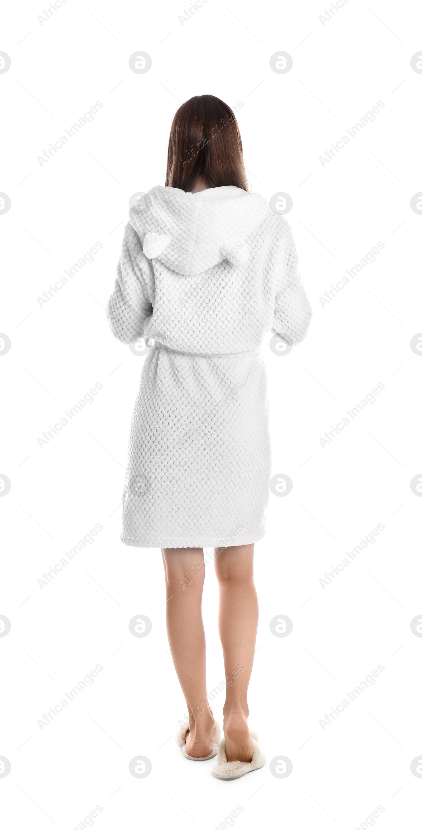 Photo of Young woman in bathrobe on white background