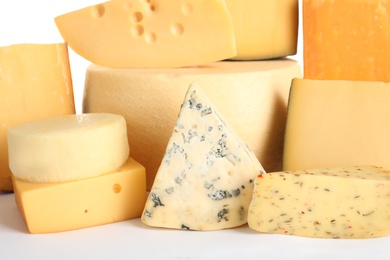 Photo of Composition with different kinds of tasty cheese on white background