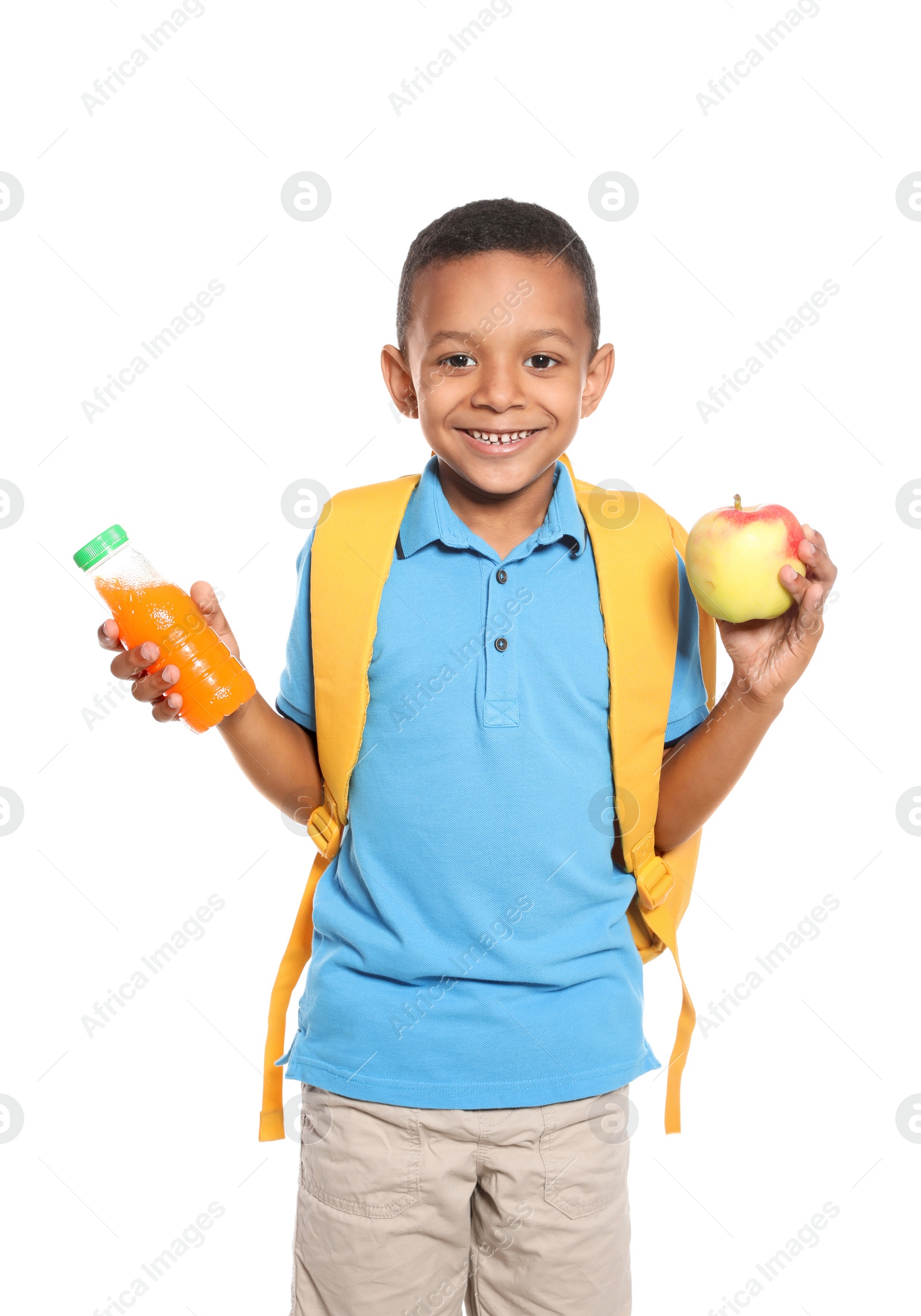 Photo of African-American schoolboy with healthy food and backpack on white background