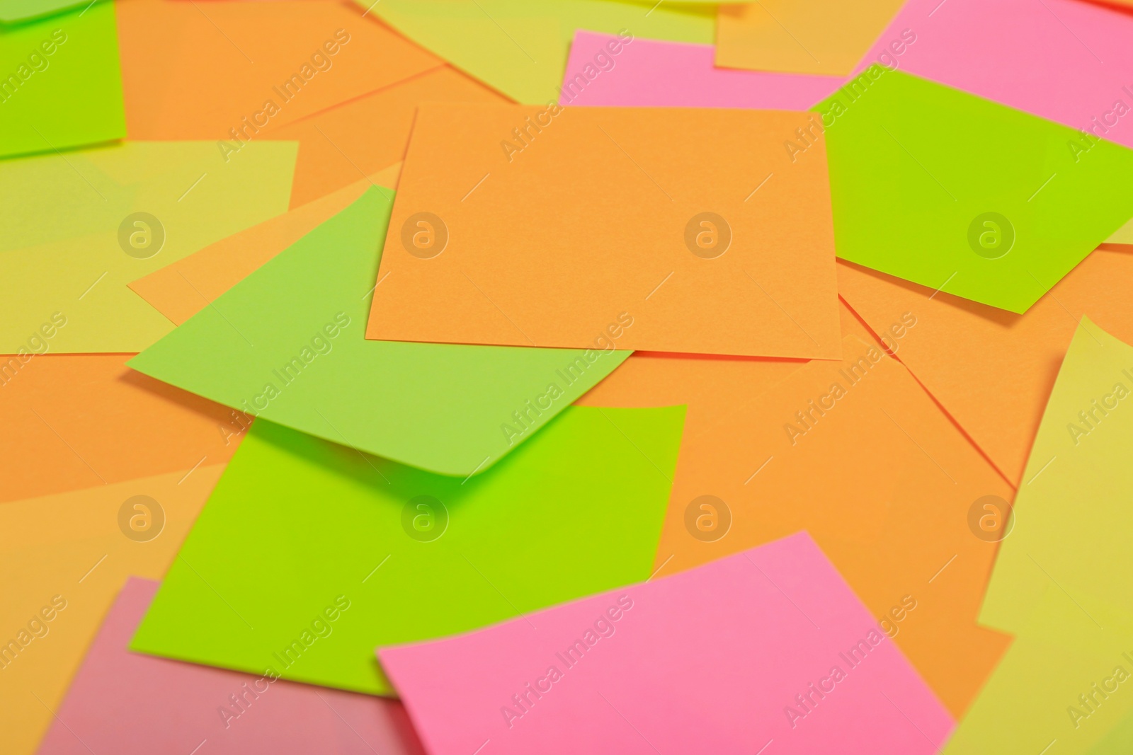 Photo of Many colorful stickers as background, closeup view