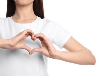 Photo of Woman showing heart on white background, closeup