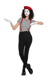 Photo of Funny mime with beret posing on white background