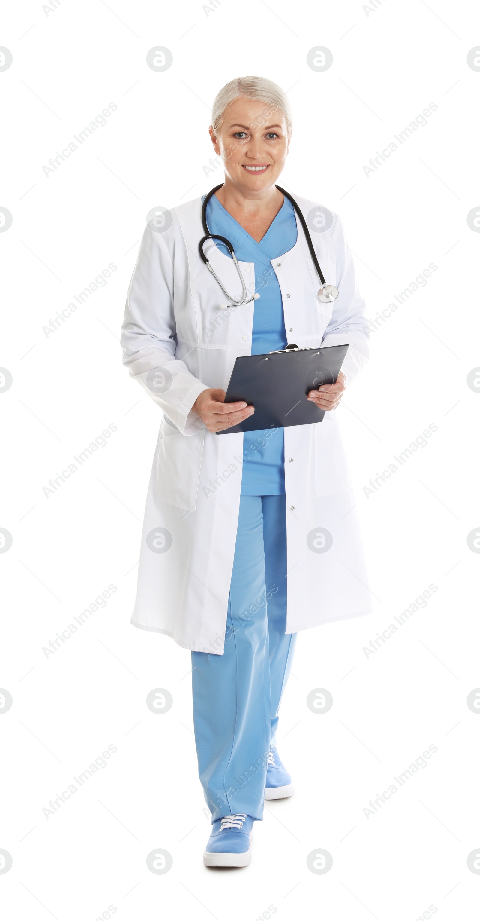 Photo of Full length portrait of female doctor with clipboard isolated on white. Medical staff