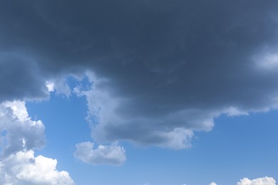 Photo of Dark gloomy clouds on sky as background