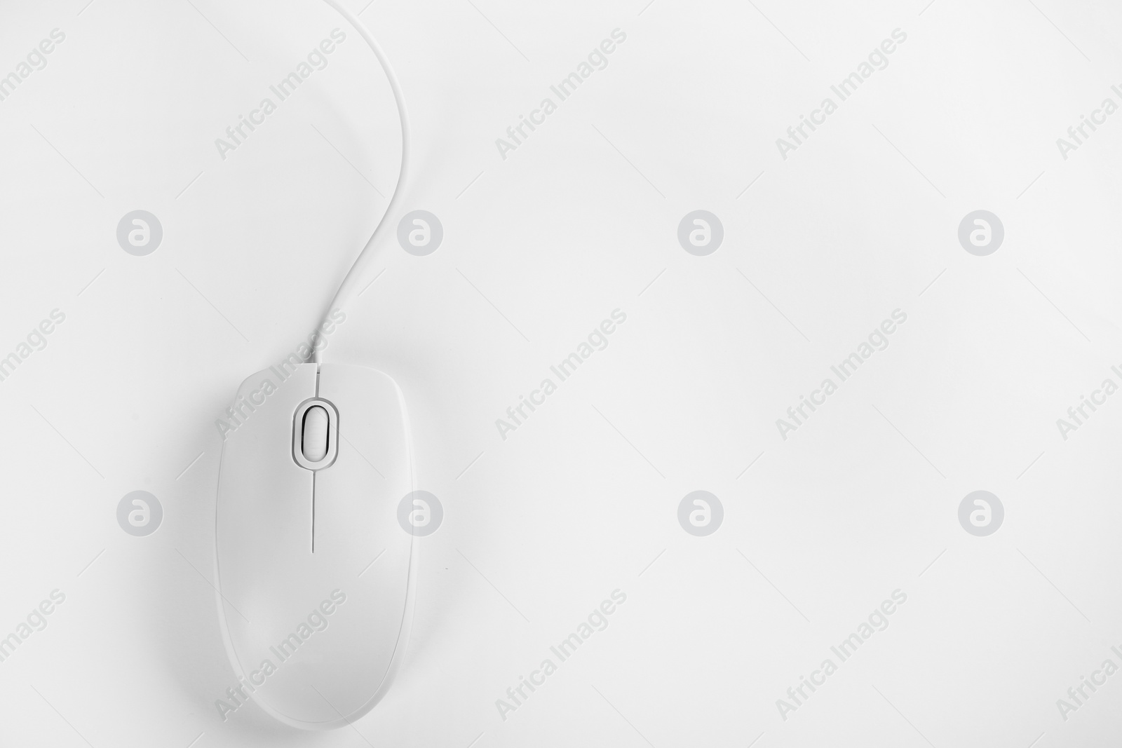 Photo of Modern wired optical mouse on white background, top view