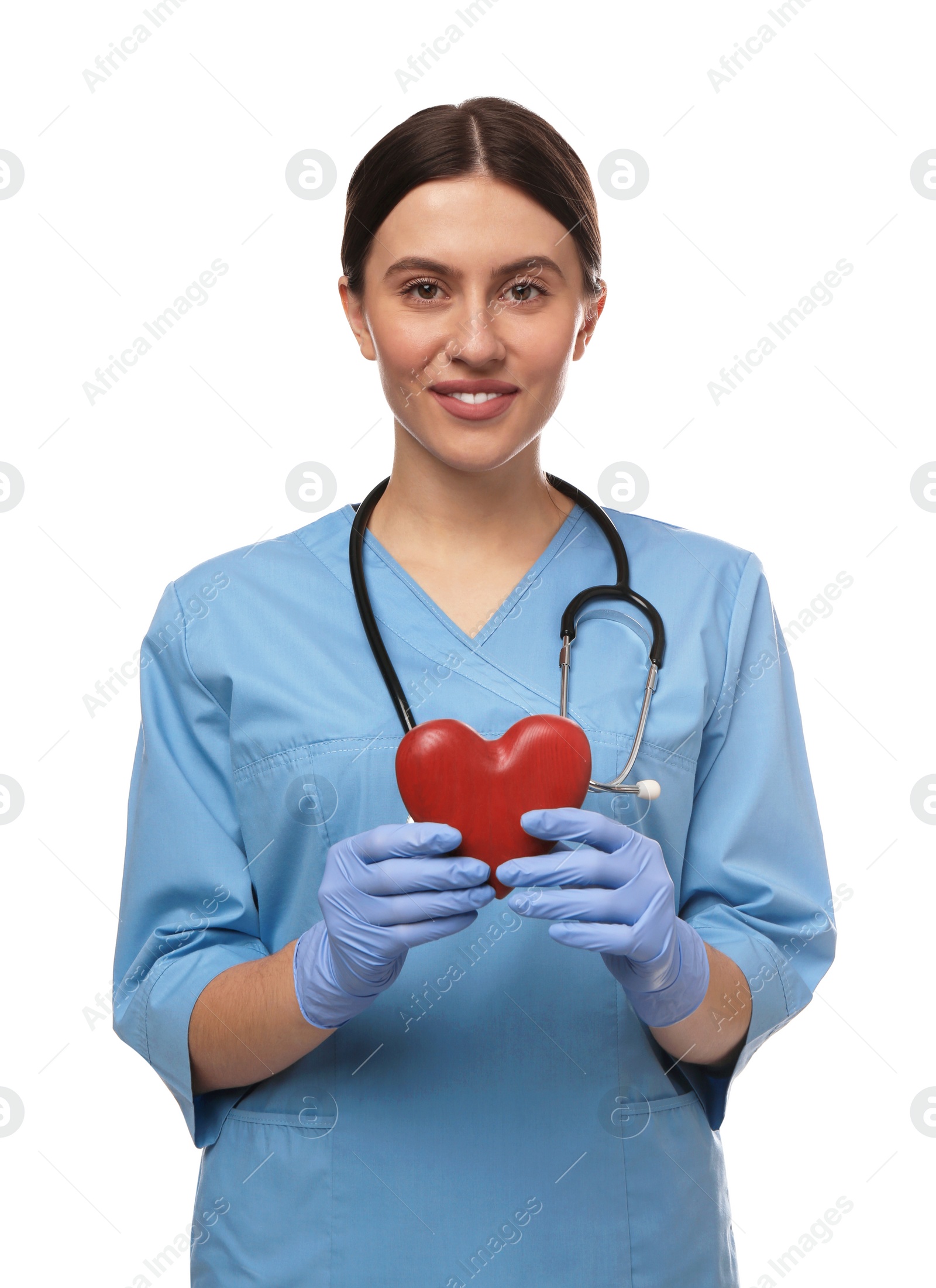 Photo of Doctor with stethoscope and red heart on white background. Cardiology concept