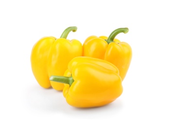 Ripe yellow bell peppers isolated on white