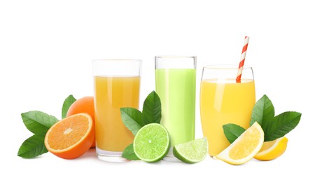 Image of Glasses of different citrus juice, fresh fruits and green leaves on white background