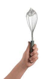 Woman holding whisk with whipped cream on white background, closeup
