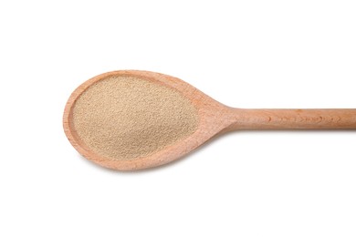 Photo of Wooden spoon with granulated yeast isolated on white, top view
