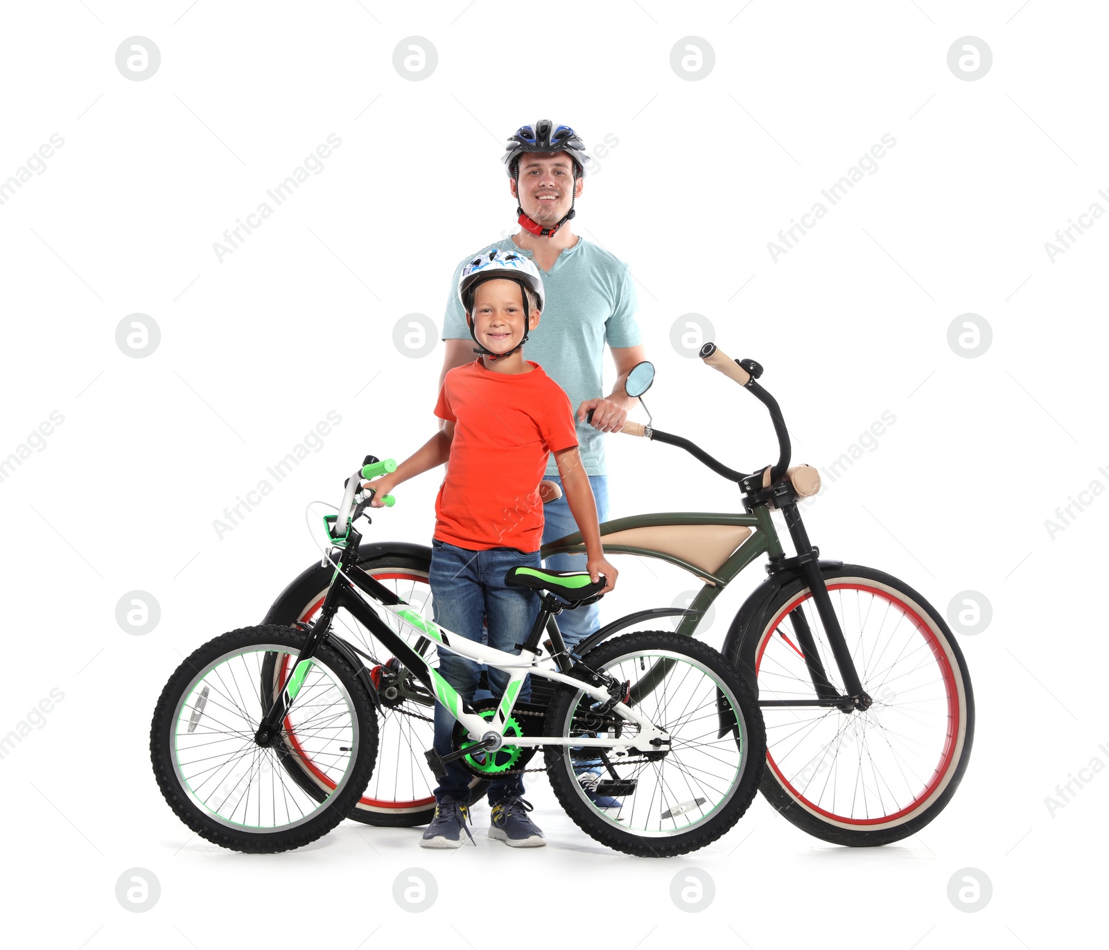 Photo of Portrait of father and his son with bicycles on white background