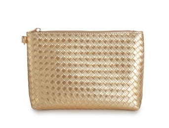 Photo of Elegant gold cosmetic bag isolated on white