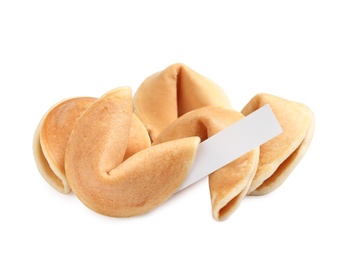 Photo of Traditional fortune cookies with prediction on white background