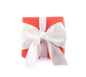 Photo of Beautiful gift box with ribbon bow isolated on white, top view